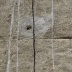Fadensonnen (Detail) | 2014<br>Papiermaché, Sand, Eitempera, Japanpapier, Tusche, Ölpastellkreide, Verbandstoff, auf Jute,<br>180 x 260 cm